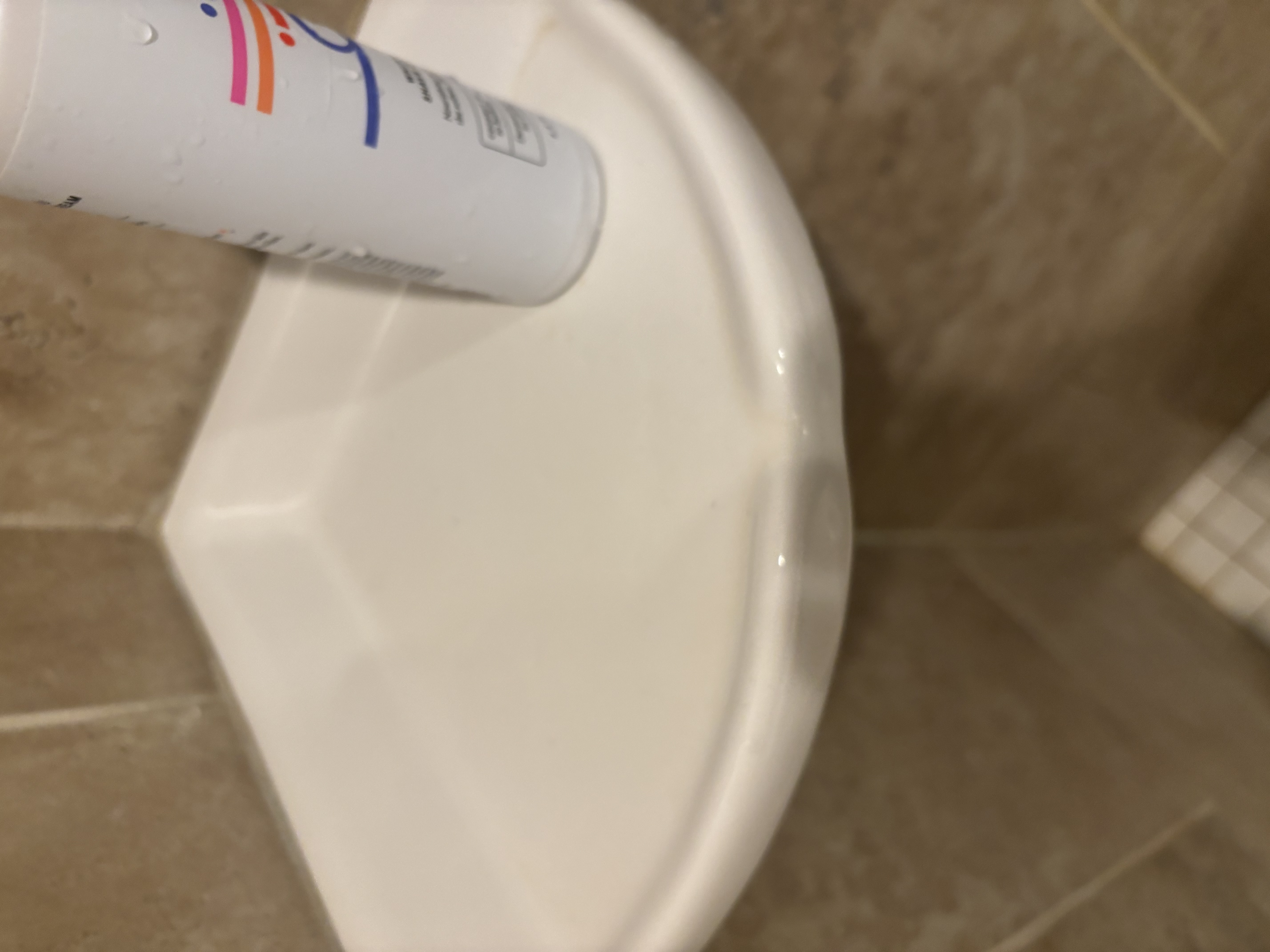 After: shower shelf cleaned