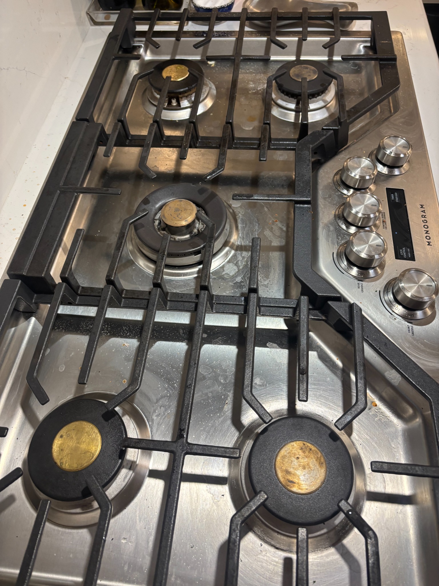 Before: gas stove with residue