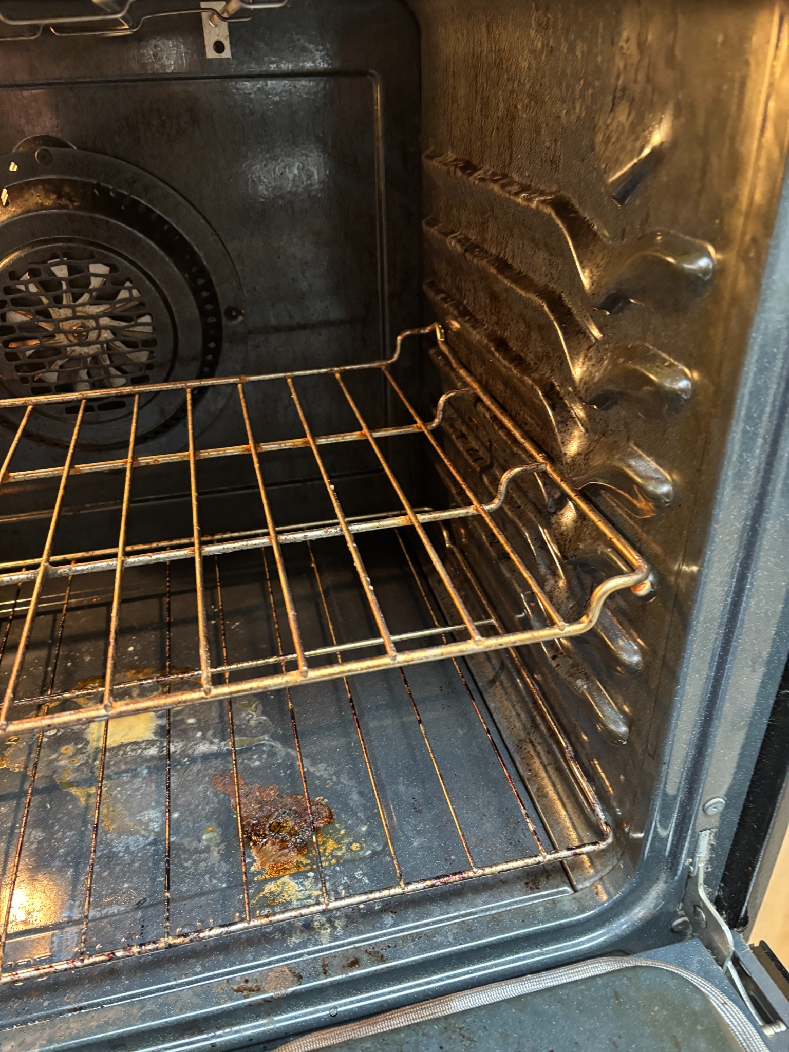 Before: oven interior with baked-on grime